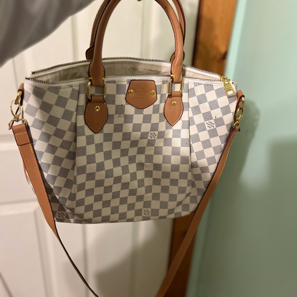 Selling this white checkered LV purse.